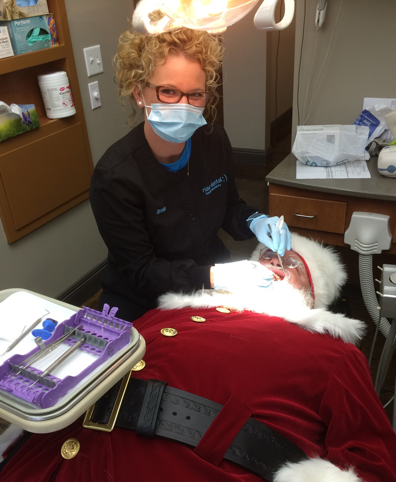 Santa getting his teeth cleaned